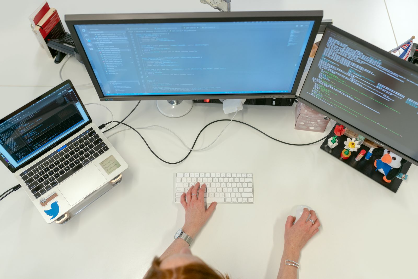 IT professional reviewing information on a monitor